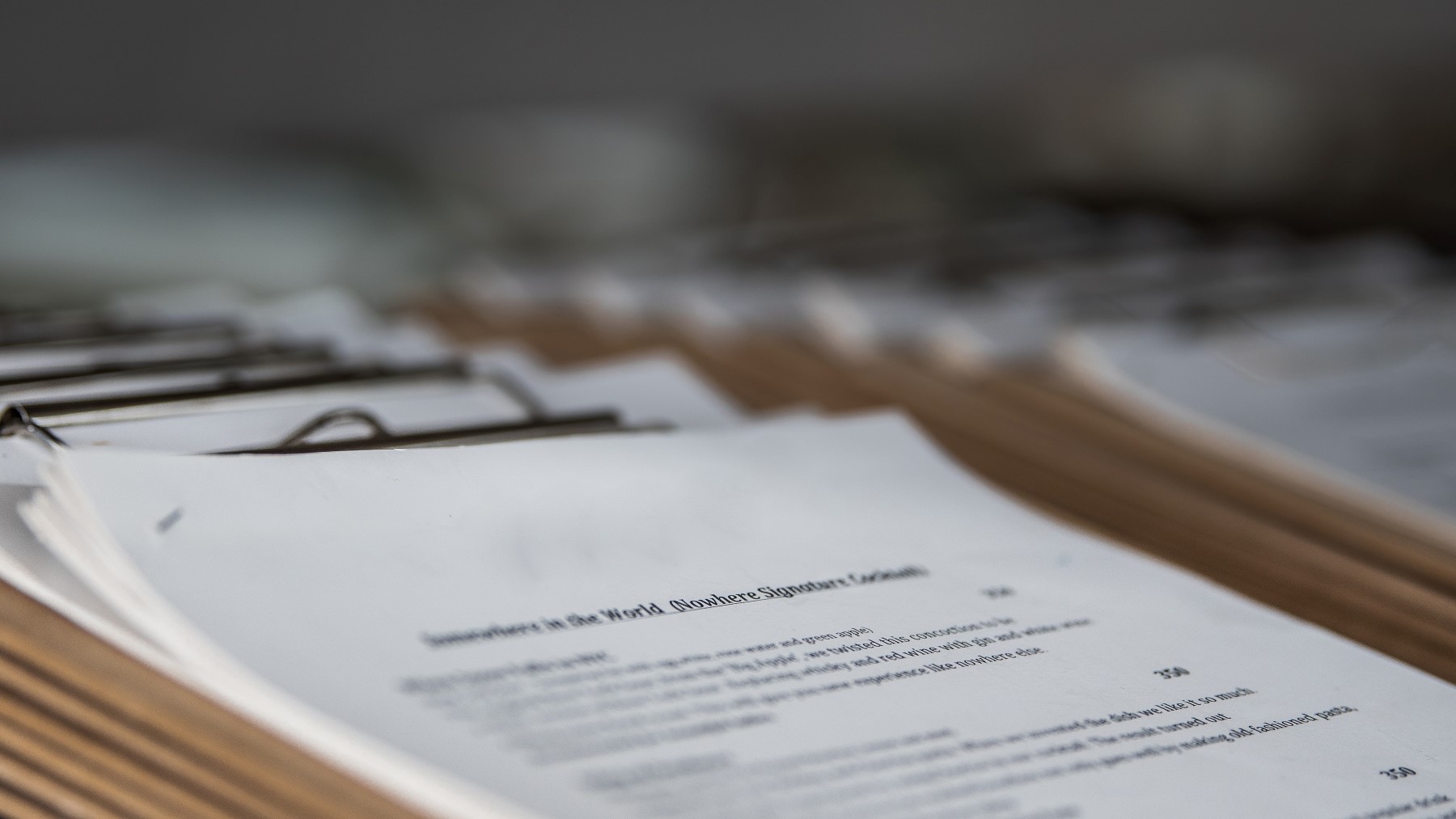 This is an image of papers on a clip board